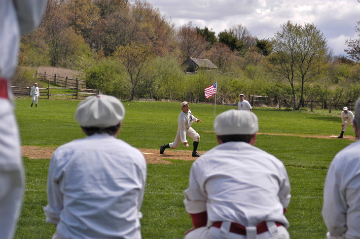 19th Century Base Ball at Old Bethpage Village Restoration. 2007 NY/NJ Cup - 4/29/07. Eric &ldquo;Express&rdquo; Miklich pitches the Mutuals of New York to a 15-0 victory over the Neshanock Club of Flemington, New Jersey in an 1864 match. The Gotham of New York Club and Washington of Mineola Club (NY) also competed at Old Bethpage Village for the annual NY/NJ Cup which was won by the Mutuals. Photo courtesy of Ray Shaw.  Click photo to return to previous page.
