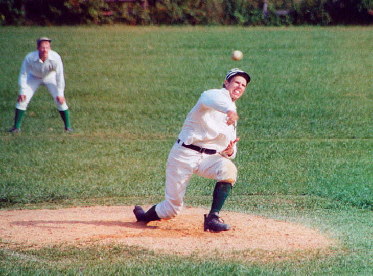 Vintage baseball photo: Eric &ldquo;Express&rdquo; Miklich pitching for the Westburys in an 1887 match at Old Bethpage Village Restoration.  The original Wesburys, located on Long Island, New York, were formed in May 1889 and competed until October of 1929.  Photo courtesy of Katie Monahan. Click photo to return to previous page.