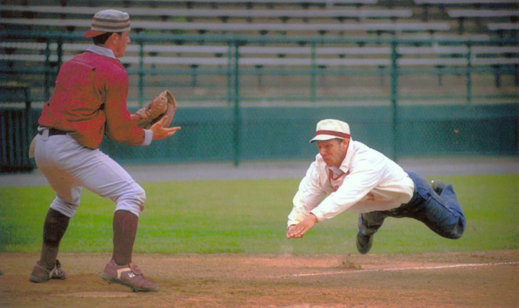 Vintage baseball photo: June 12, 1998: Eric &ldquo;Express&rdquo; Miklich sliding home for the Brooklyn Atlantics (NY) in an 1887 rules match against the Glen Head Zig Zags (NY) on Doubleday Field in Cooperstown, New York.  Photo by Tom Ferrara.  Click photo to return to previous page.